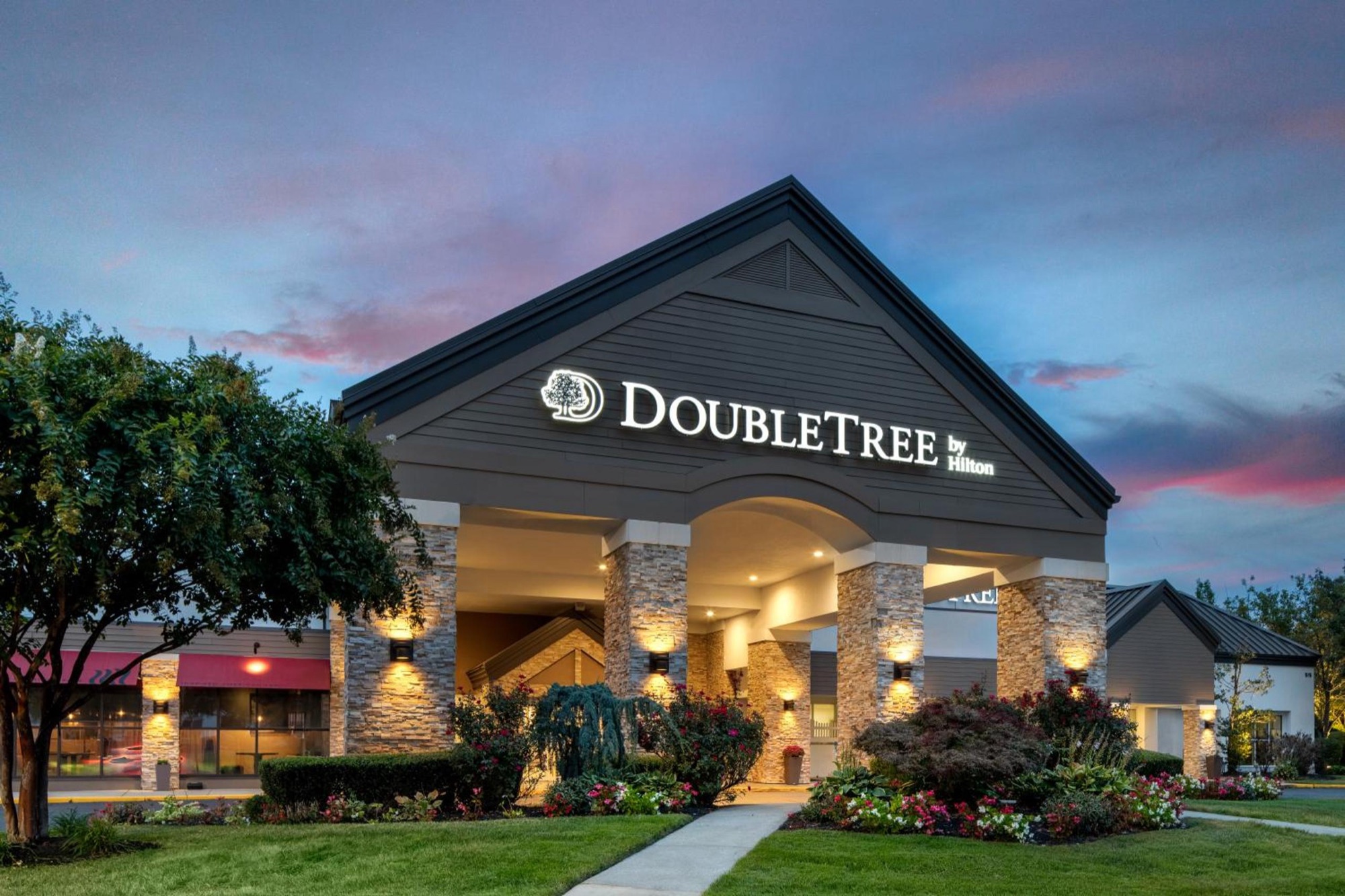 DoubleTree Suites Mt. Laurel entrance illuminated at night